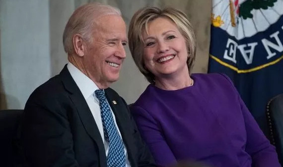 /image/2020/11/15/crop-16_6_338x570_joe-biden-and-hillary-clinton-1360136.jpeg